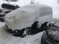 verschneites Auto